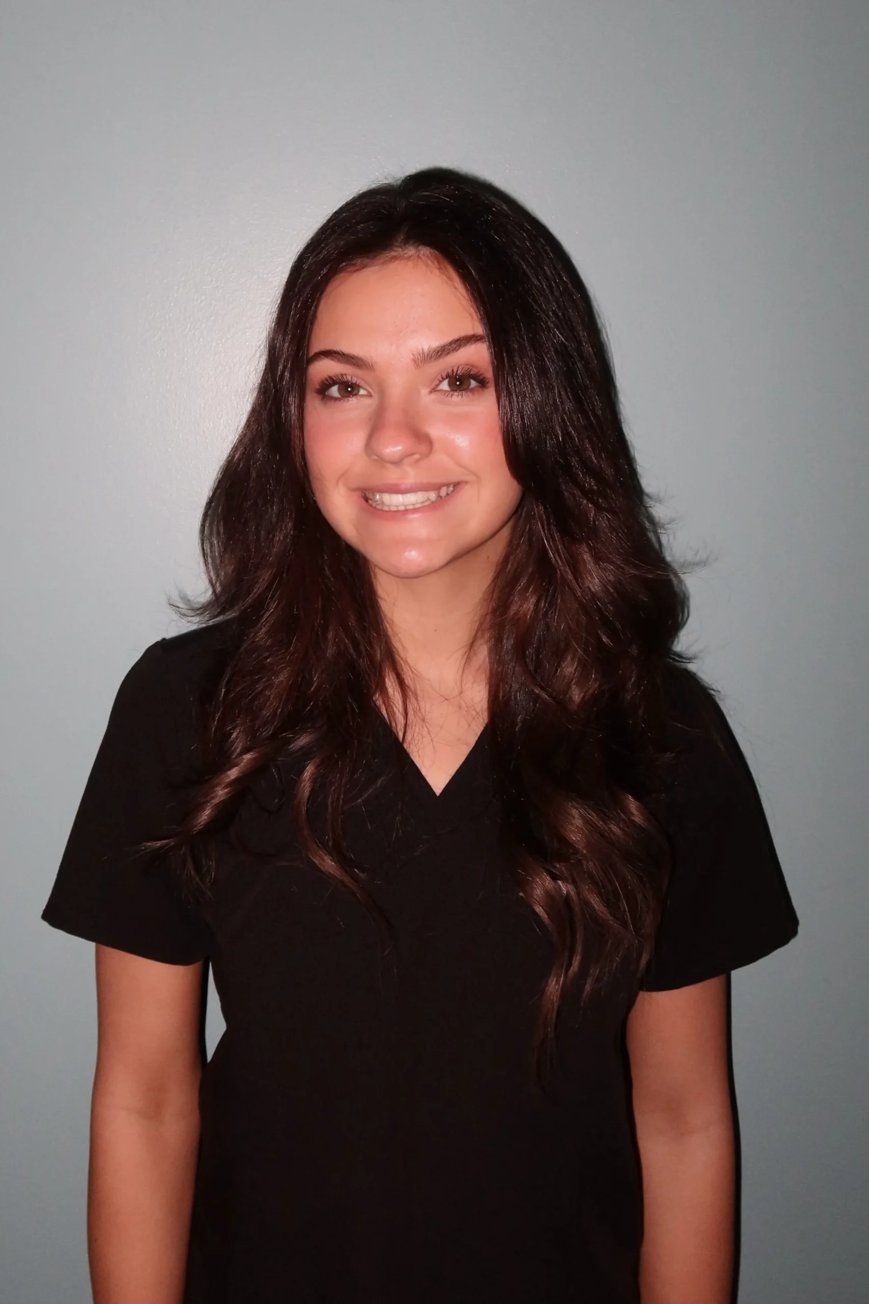 a woman smiling at camera