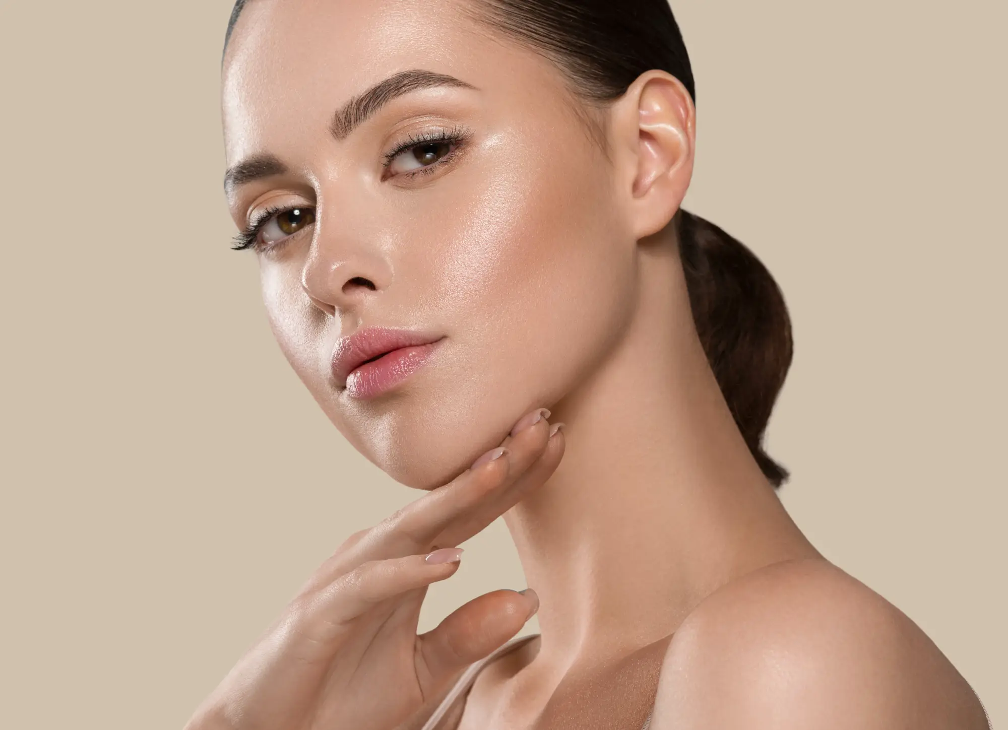 a woman with her hand on her chin